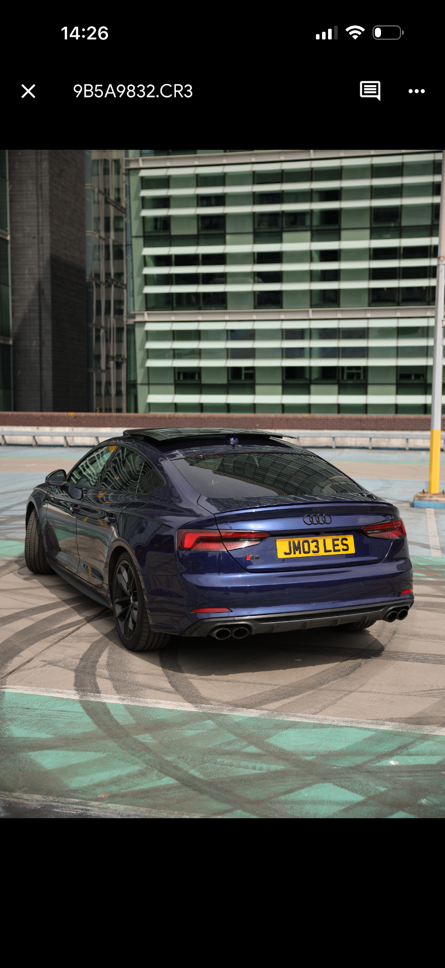 Audi S5 rear view on rooftop car park